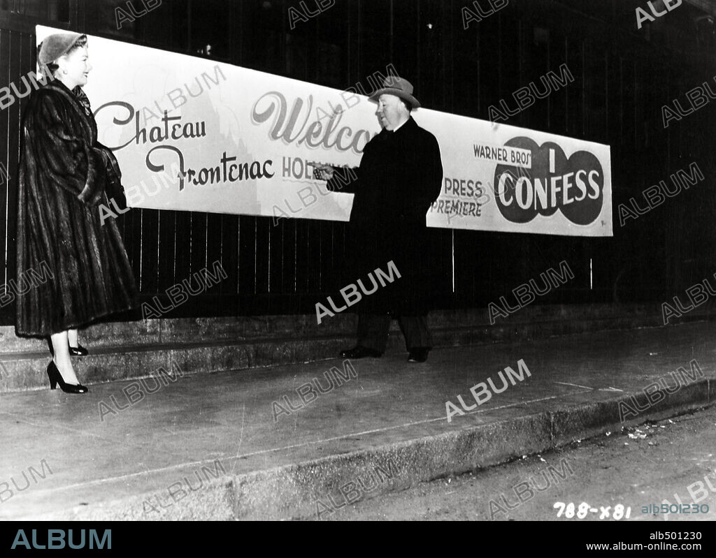 ALFRED HITCHCOCK and ANNE BAXTER in I CONFESS, 1953, directed by ALFRED HITCHCOCK. Copyright WARNER BROTHERS.