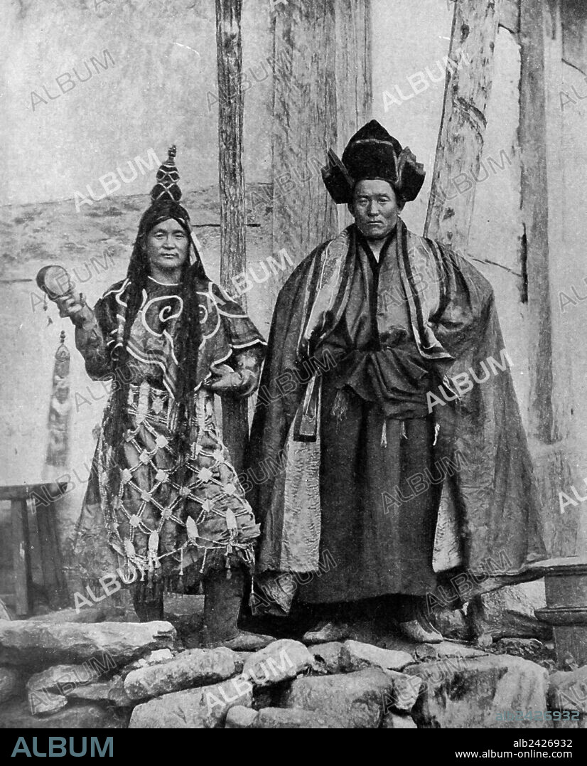 Historical Geography. 1900. India. Talung Monastery is the most sacred in all Sikkim, being packed with objects of veneration and antiquity. To this foundation these two Lamas belong, and the one on the left is wearing the rugen, a complicated adornment of apron and circlet, beautifully carved but gruesome in origin, for it is made from uman bones. The cloak and hat of the other are of great age and value.