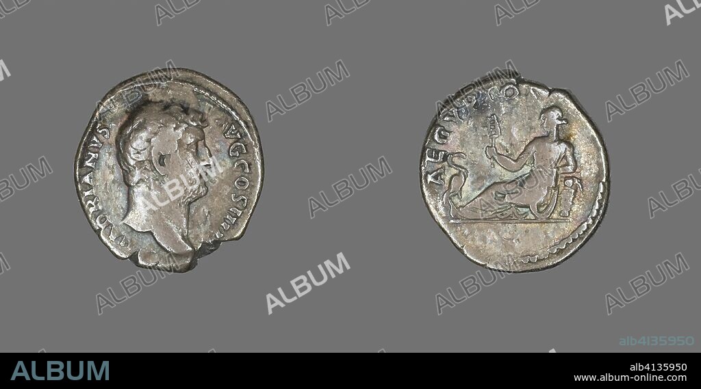 ANCIENT ROMAN. Denarius (Coin) Portraying Emperor Hadrian. Roman, minted in Rome. Date: 134 AD-138 AD. Dimensions: Diam. 1.9 cm; 3.01 g. Silver. Origin: Roman Empire.