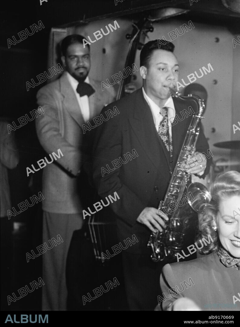 WILLIAM PAUL GOTTLIEB. Portrait of Lucky Thompson, Hilda A. Taylor, and Al McKibbon, Three Deuces, New York, N.Y., ca. July 1948.