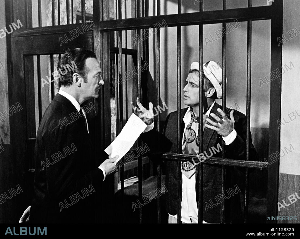 DAVID NIVEN and MARLON BRANDO in BEDTIME STORY, 1964, directed by RALPH LEVY. Copyright UNIVERSAL PICTURES.