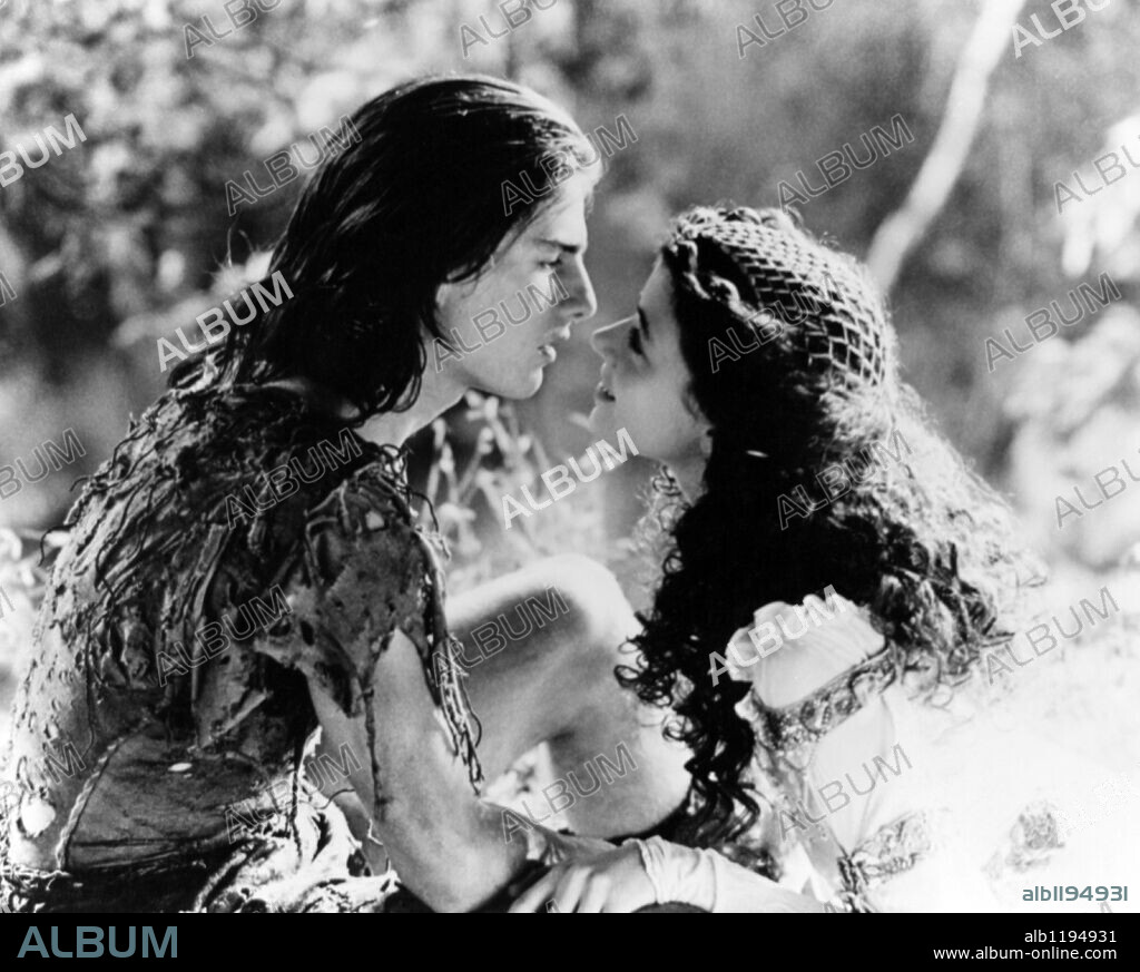 MIA SARA and TOM CRUISE in LEGEND, 1985, directed by RIDLEY SCOTT. Copyright 20TH CENTURY FOX.