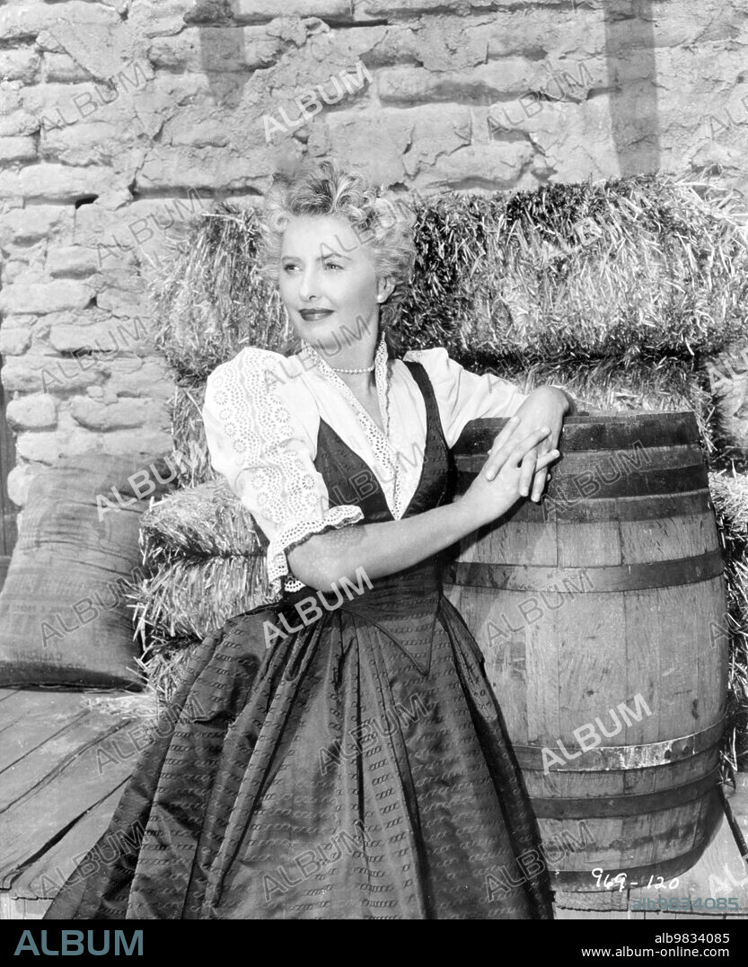 BARBARA STANWYCK in FORTY GUNS, 1957, directed by SAMUEL FULLER. Copyright 20TH CENTURY FOX.