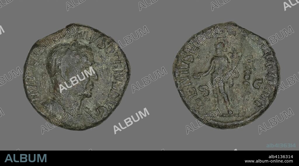 ANCIENT ROMAN. Coin Portraying Emperor Aurelian. Roman. Date: 270 AD-275 AD. Dimensions: Diam. 2.9 cm; 16.65 g. Bronze. Origin: Roman Empire.