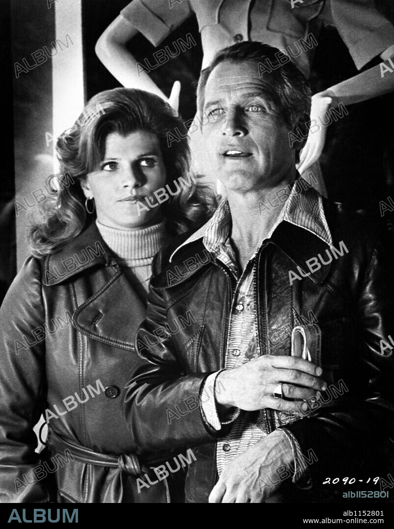 JENNIFER WARREN and PAUL NEWMAN in SLAP SHOT, 1977, directed by GEORGE ROY HILL. Copyright UNIVERSAL PICTURES.