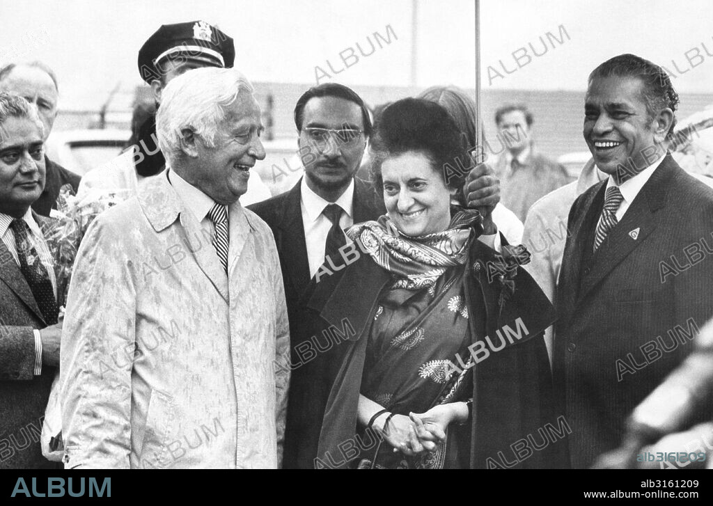 New York, New York: November 3, 1961 India Prime Minister Indira Gandhi as she as arrives at JFK airport and is met by United States ambassador to India Kenneth Keating.