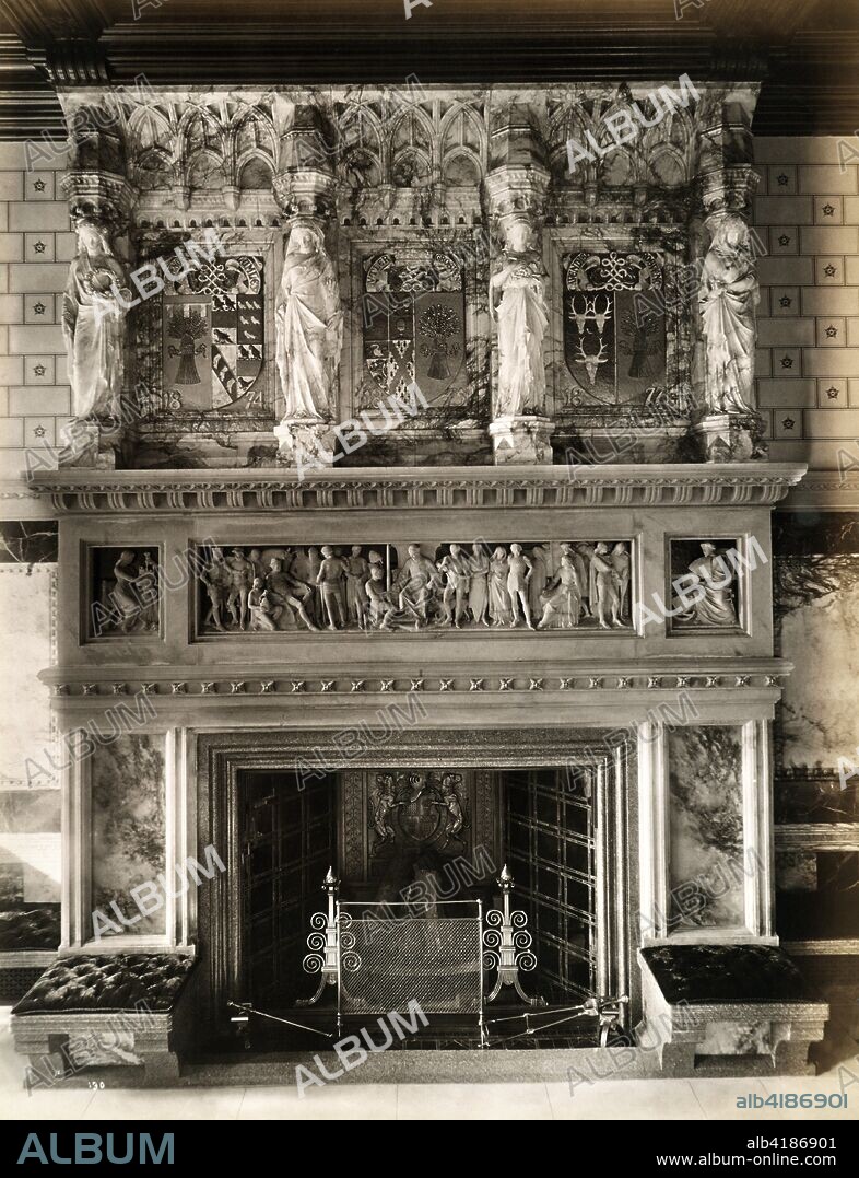 Fireplace and ornate mantlepiece in the saloon at Eaton Hall, Eccleston, Cheshire, 1887. Eaton Hall was remodelled in the Gothic style in 1870-1882 by Alfred Waterhouse for the Duke of Westminster. In 1963 the main part of the hall was demolished, and a new hall constructed. The chapel, clock tower and stables were retained.