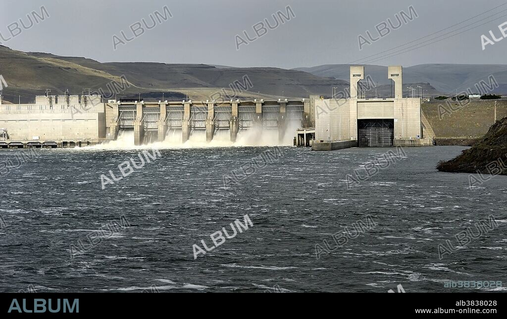 Lower Monumental Lock and Dam is a hydroelectric, concrete gravity dam on the Snake River in Washington State.  It is part of the Columbia River Basin system of dams, built and is operated by the U.S. Army Corps of Engineers. Its electricity is distributed by the Bonneville Power Administration.  The main structure and three generators were completed in 1969, with an additional three generators added in 1981. Generating capacity is 810 megawatts, with an overload capacity of 932 MW. The spillway has eight gates and is 572 feet (176 m) long.