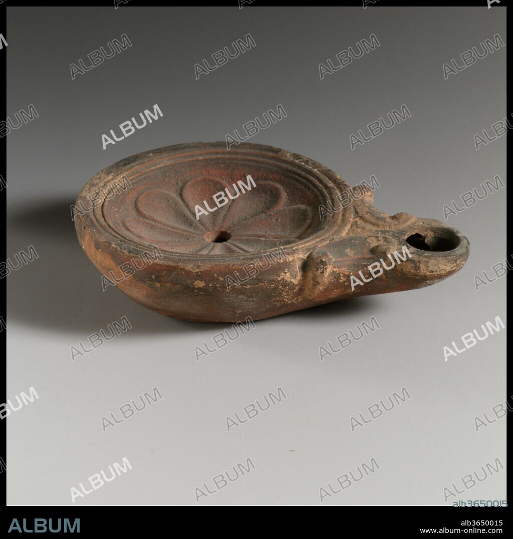 Terracotta oil lamp. Culture: Roman. Dimensions: Other: 3 13/16 × 15/16 in. (9.7 × 2.4 cm). Date: 1st century B.C.-1st century A.D..