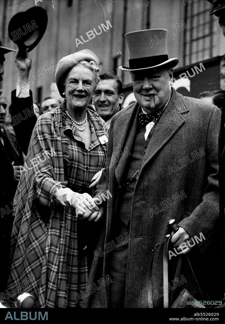 Backing Conservative?
Mr. and Mrs. Winston Churchill arrive at Epsom for the Derby today, June 4, Obvious bet for Britain's Tory Leader was Conservative. June 15, 1949. (Photo by Associated Press Photo).