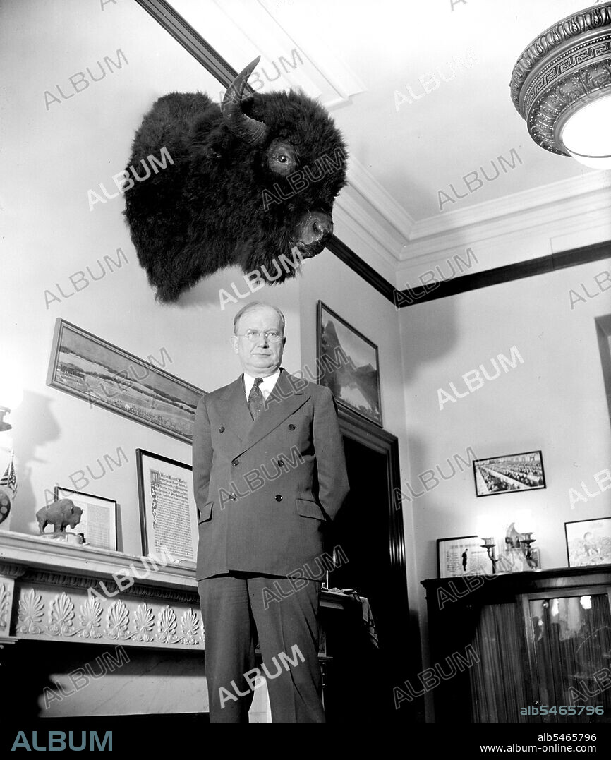 Senator Burton K. Wheeler of Montana standing in his office