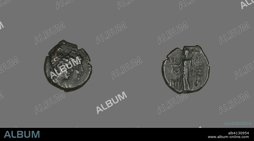 ANCIENT GREEK. Tetras (Coin) Depicting the Dioscuri. Greek. Date: 203 BC-89 BC. Dimensions: Diam. 1.7 cm; 2.72 g. Bronze. Origin: Greece.