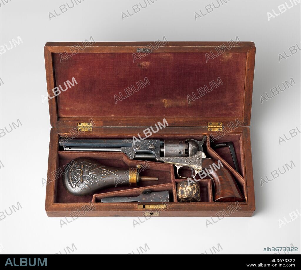 Colt Model 1851 Navy Percussion Revolver, Serial Number 29705, with Case and Accessories. Culture: American, Hartford, Connecticut. Dimensions: L. of pistol 13 in. (33 cm); L. of barrel 7 1/2 in. (19 cm); Cal. .36 in. (9 mm); case: 14 1/4 x 6 3/8 x 2 1/4 in. (36.2 x 16.2 x 5.6 cm). Engraver: Engraved by Gustave Young (American (born Prussia), 1827-1895 Springfield, Massachusetts). Manufacturer: Samuel Colt (American, Hartford, Connecticut 1814-1862). Date: ca. 1853-54.
Gustave Young (1827-1895), a German-born craftsman, engraved firearms with intricate and elaborate ornament for Colt in Hartford, Connecticut, and Smith & Wesson in Springfield, Massachusetts. His posthumous fame among firearms collectors caused the decoration on many pieces to be misattributed to his hand. Therefore, as one of the few documented examples of Young's work, this pistol is of primary importance as a touchstone for understanding his style and technique.