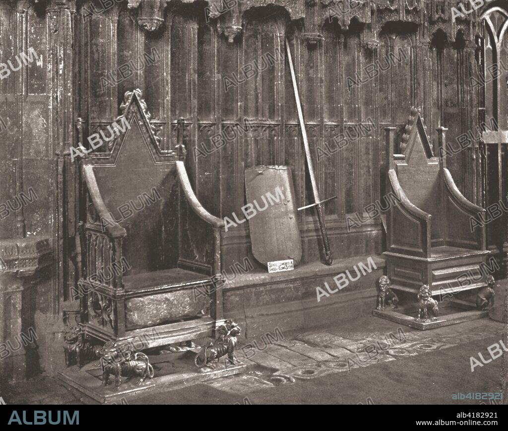 The Coronation Chair in Westminster Abbey, London, 1894. The Coronation Chair, commissioned in 1296 by King Edward I and known historically as St Edward's Chair or King Edward's Chair, is a wooden throne on which the British monarch sits when he or she is invested with regalia and crowned at the coronation. Beneath it is the Stone of Scone. From Beautiful Britain; views of our stately homes. [The Werner Company of Chicago, 1894].