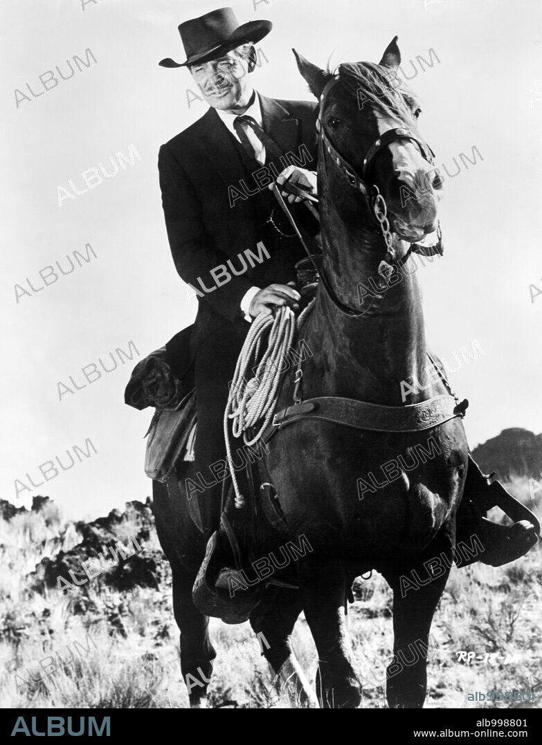 CLARK GABLE in THE KING AND FOUR QUEENS, 1956, directed by RAOUL WALSH. Copyright UNITED ARTISTS.