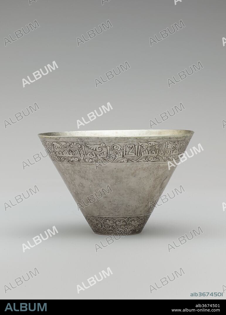 Cup with a Poem on Wine. Dimensions: H. 3 1/4 in. (8.3 cm)
Diam. 5 in. (12.7 cm)
Wt. 6.3 oz. (178.6 g). Poet: Ibn Sukkara al-Hashimi (d. A.H. 385/ A.D. 995-6). Date: second half 10th-11th century.
This cup is inscribed in Arabic in kufic below the outside rim:

Drink! For this day has a special boon, which if you had known about it / You would have hurried up with entertainment and hastened with rapture! // Don't hold the cup back, but drink it diluted, until you die from it, (dead) without reason.