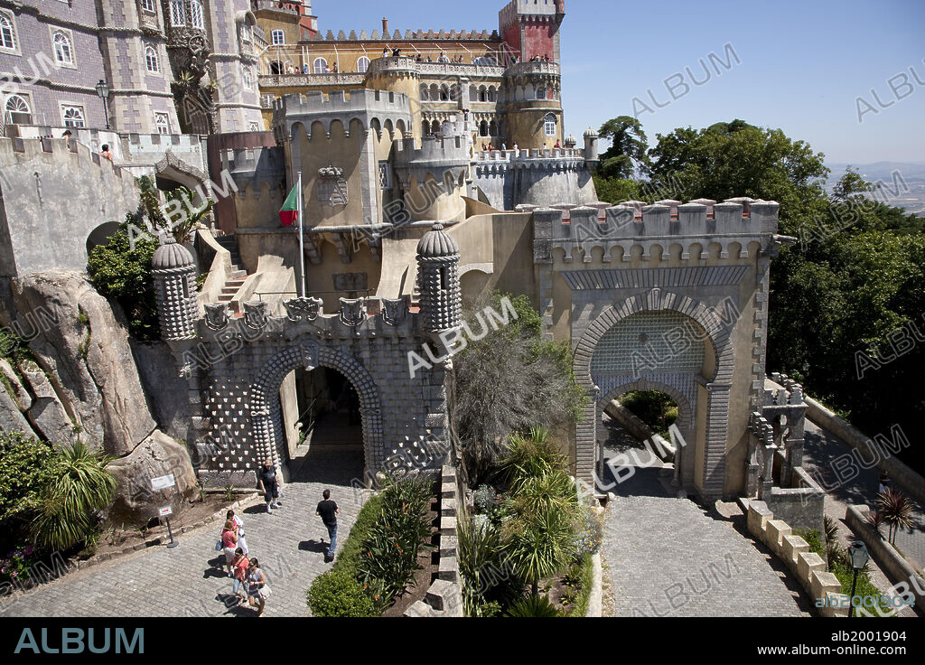 Pena National Palace, is located on a rocky ridge above Sintra. It's one of several palaces in the Sintra Hills, which were awarded UNESCO World Heritage status as a "cultural landscape" in 1995. The palace, which was built from 1842 to 1854, features a mixture of building styles that range from Moorish to pseudo-medieval. It occupies the site of a Hieronymite monastery that was abandoned after the Great Lisbon Earthquake of 1755 and Portugal's outlawing of religious orders in 1834. The palace is surrounded by Parque da Pena, which offers walking paths, fountains, lakes, follies, and belvederes.