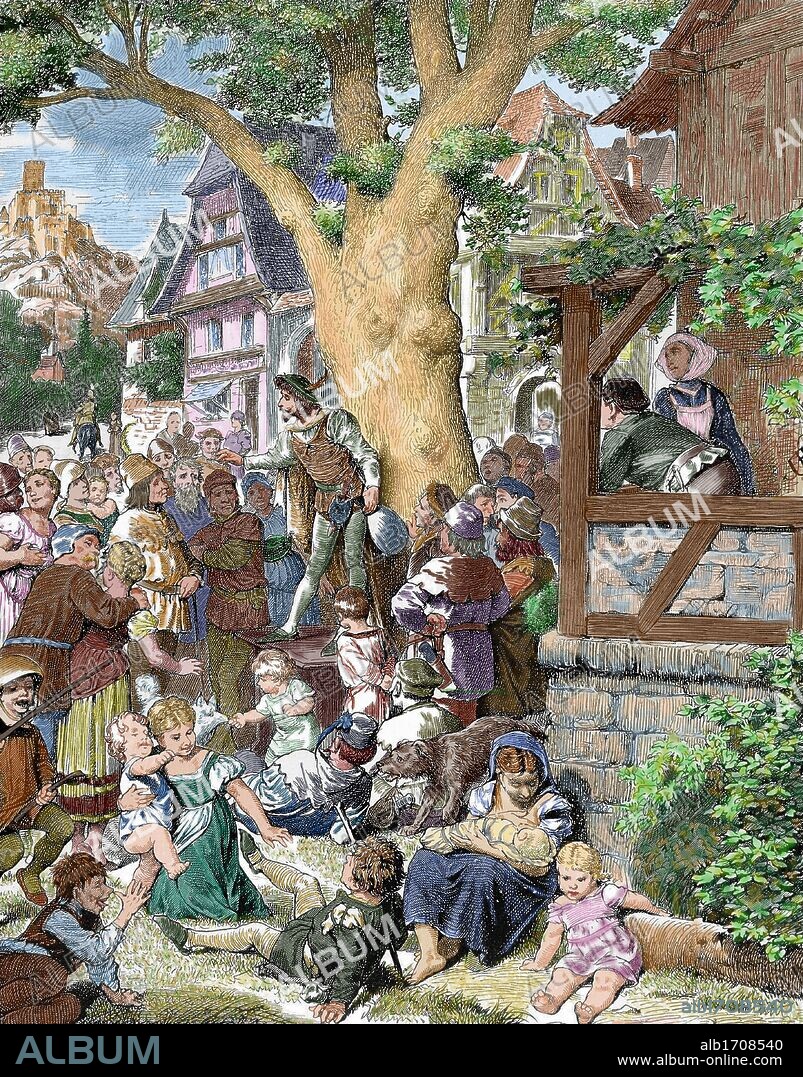 SOCIEDAD EDAD MEDIA. HISTORIA DE ALEMANIA. JUGLAR recitando poemas y canciones al pie de un tilo, en la plaza de una aldea. Grabado coloreado de "Germania". (Año 1882) .