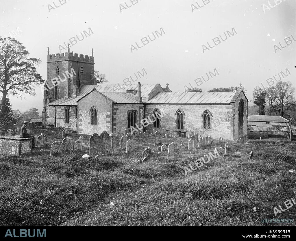 St Mary's Church, Ashbury, Oxfordshire, c1860-c1922. The church dates from the Norman period. This view shows the squat tower and the south transept.