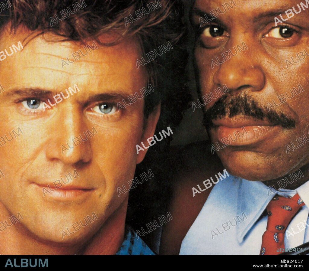 DANNY GLOVER and MEL GIBSON in LETHAL WEAPON 2, 1989, directed by RICHARD DONNER. Copyright WARNER BROTHERS.