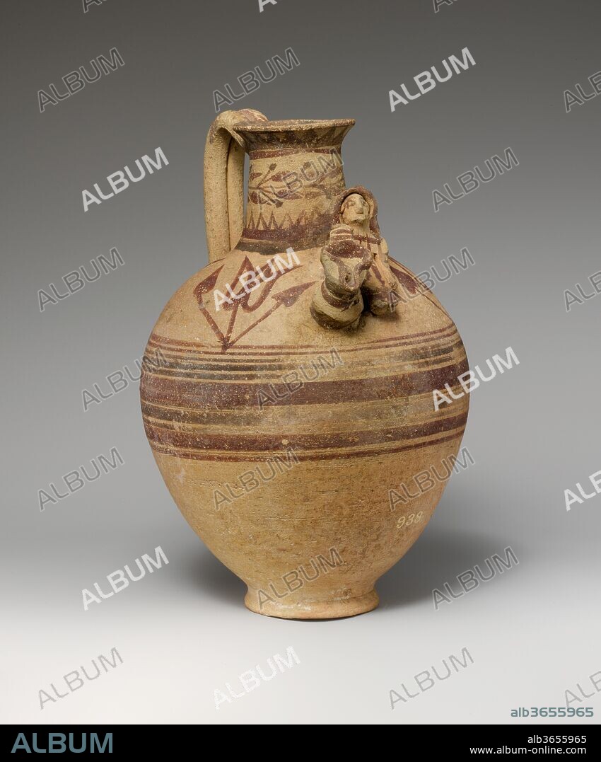 Terracotta jug. Culture: Cypriot. Dimensions: H. 9 15/16 in. (25.3 cm). Date: 600-480 B.C..
On the shoulder, a female figure holding a miniature jug
This piece is part of a large group that was undoubtedly made for a specific, possibly ritual, function.