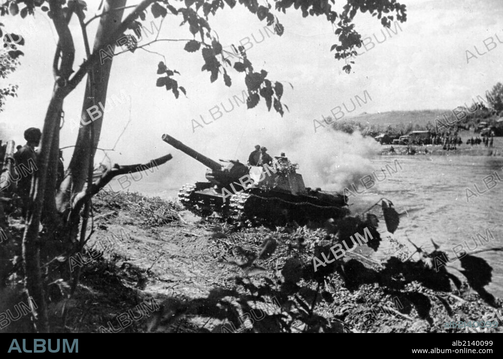 World war 2, an su-152 self-propelled howitzer (152mm) on a heavy tank chassis, crossing a river, ukraine.