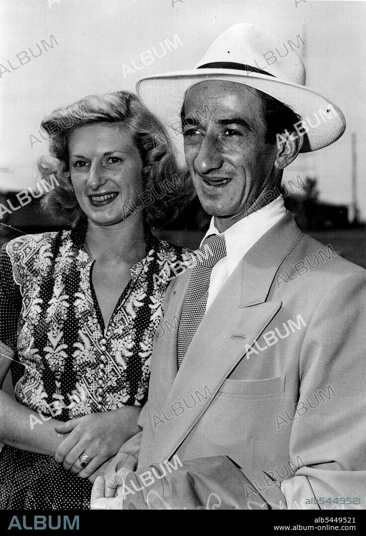 Melbourne jockey Jack Purtell and his wife look in on Sydney on their way home after a holiday in Fiji. January 23, 1952.