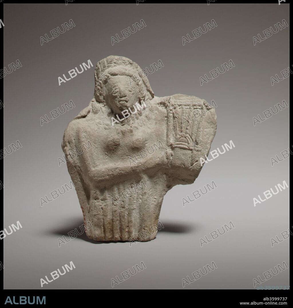 Standing female kithara player. Culture: Cypriot. Dimensions: H. 3 1/8 in. (8 cm). Date: 3rd century B.C. or later.
The figurine is mold-made and solid. The back is handmade and flat. The figurine is very thin, like a plaque.