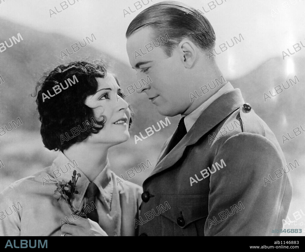 JACK LUDEN y SHARON LYNN en UNA LLAMA EN EL CIELO, 1927 (AFLAME IN THE SKY), dirigida por J. P. MCGOWAN. Copyright ROBERTSON-COLE DISTRIBUTING.