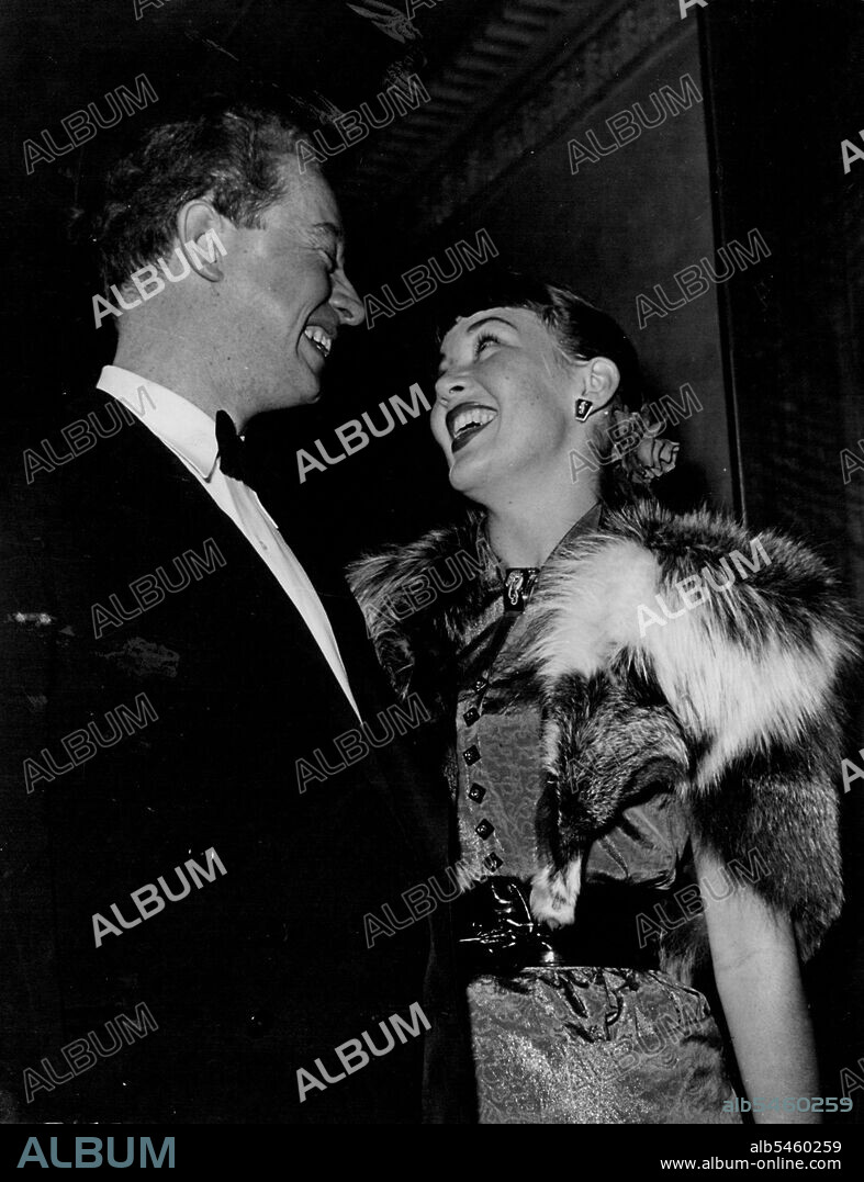 English stage and screen star Jimmy Hanley, from the cast of to Dorothy, A Son, brought leading lady, Babs McKinnon, to the premiere. March 10, 1952.