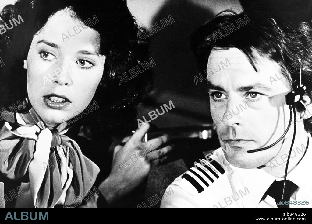 ALAIN DELON and SYLVIA KRISTEL in CONCORDE: THE CONCORDE: AIRPORT '79, 1979, directed by DAVID LOWELL RICH. Copyright UNIVERSAL PICTURES.