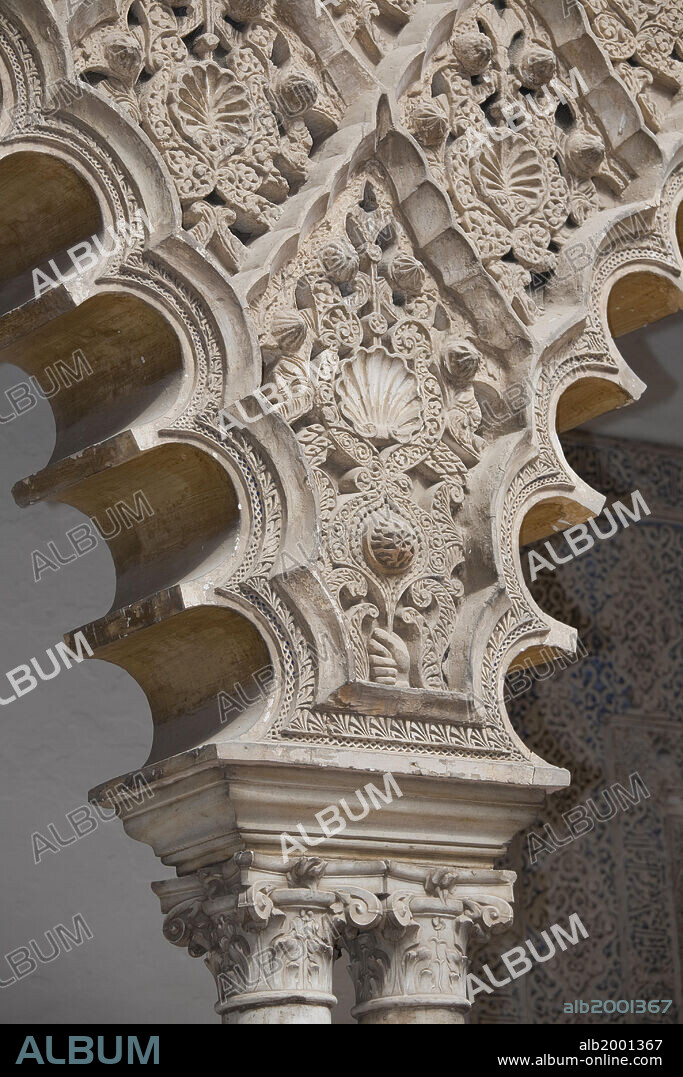 The Royal Fortresses (Reales Alcazares) of Seville are a fortified palatial complex, originally a Moorish fort from the year 913. Additions were made to the fort by Muslim and Christian rulers until the 16th century. The palace is one of the best preserved examples of Mudejar architecture. The Courtyard of the Maidens (Patio de las Doncellas) was built in the 14th century. It was named after the legend that the Moors demanded an annual tribute of 100 virgins from Christian kingdoms in Iberia. The Royal Palace of Seville was declared a World Heritage Site by UNESCO in 1987.