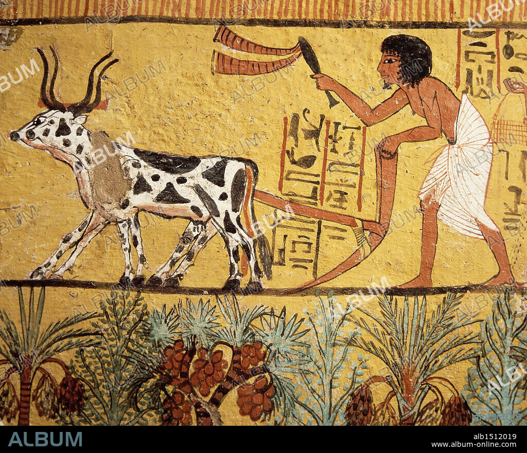 Egypt - Ancient Thebes (UNESCO World Heritage List, 1979). Village of state labourers at Dayr al-Madinah (Deir el-Medina). Tomb of Sennedjem, New Kingdom, Dynasty XIX. Mural painting depicting Sennedjem ploughing the fields of Iaru.