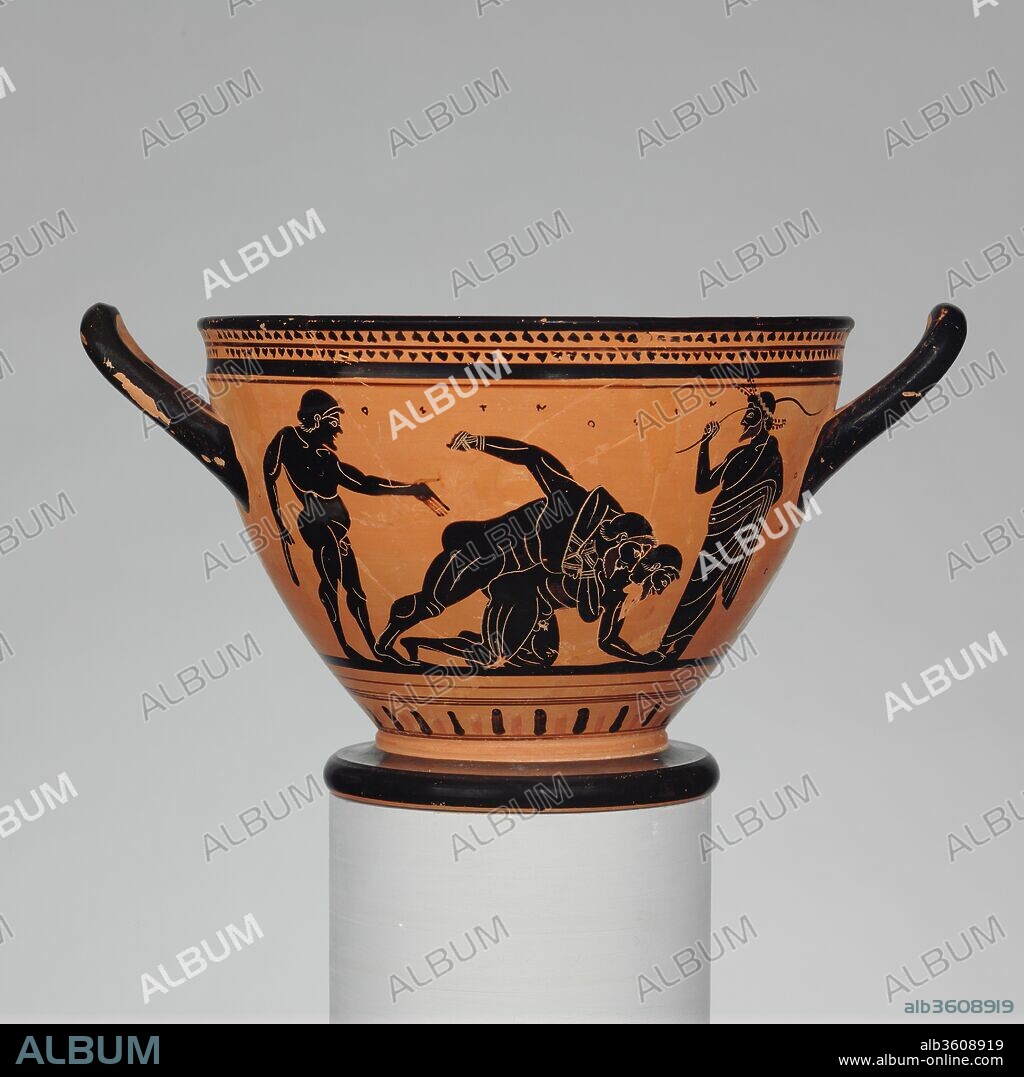 Terracotta skyphos (deep drinking cup). Culture: Greek, Attic. Dimensions: H. 6 3/8 in. (16.2 cm)
diameter  8 7/8 in. (22.5 cm). Date: ca. 500 B.C..
The Pankration was an athletic contest that combined boxing, wrestling, and kicking.  In the surviving representations, it is not always easy to distinguish the pankration from boxing or wrestling matches.  Such is the case here where the competition takes place under the eyes of a trainer and an onlooker.