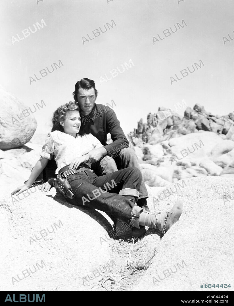 ANNE BAXTER and GREGORY PECK in YELLOW SKY, 1948, directed by WILLIAM A. WELLMAN. Copyright 20TH CENTURY FOX.