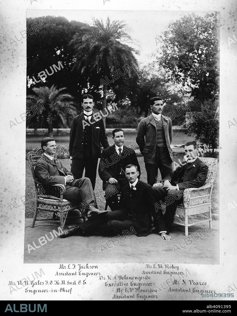 A group of Engineers who built the Curzon Bridge, Allahabad. Formal group pose in a garden. Sitters named from left: 'Mr R.R. Gales, FCHM, Inst CE, Engineer-in-Chief; Mr L.F. Jackson, Assistant Engineer; Mr R.A. Delanougerede, Executive Engineer; Mr S.P. Flowerdew, Assistant Engineer; Mr E.B. Robey, Assistant Engineer; Mr N. Pearce, Assistant Engineer'. 1902-05. Source: Photo 430/58(1). Language: English.