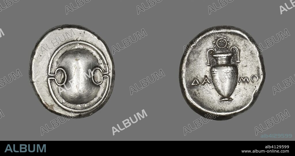 ANCIENT GREEK. Stater (Coin) Depicting a Shield. Greek; minted in Thebes. Date: 379 BC-338 BC. Dimensions: Diam. 2.5 cm; 12.21 g. Silver. Origin: Thebes.