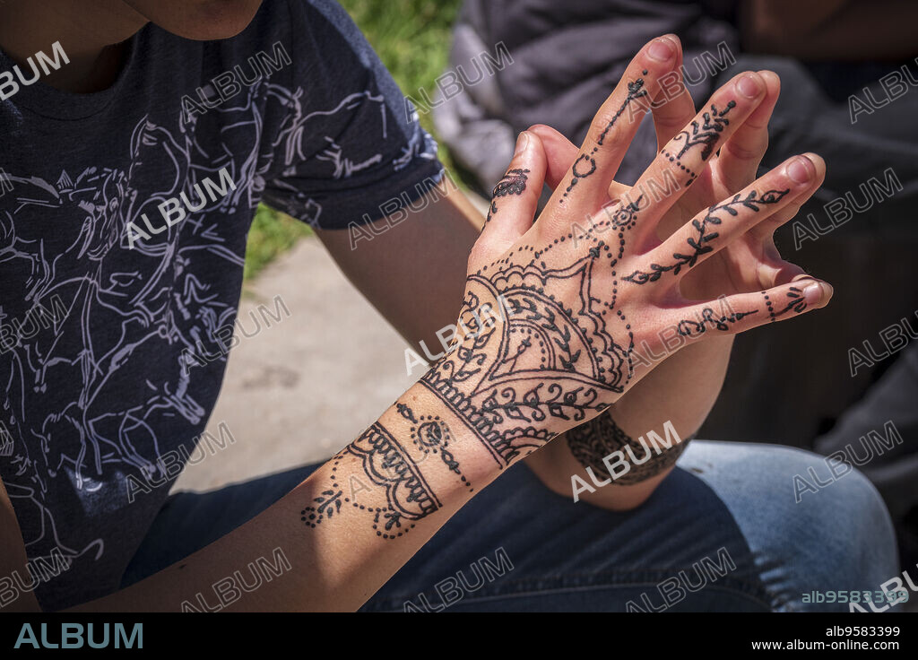 Vertical Shot of a Female S Hand with a Henna Tattoo Under the Bright Sky  in Morocco Stock Photo - Image of drawing, girl: 171660284