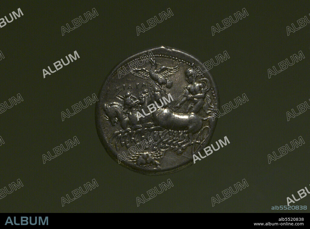 Coin with depiction of a quadriga driven by a charioteer. Dated ca