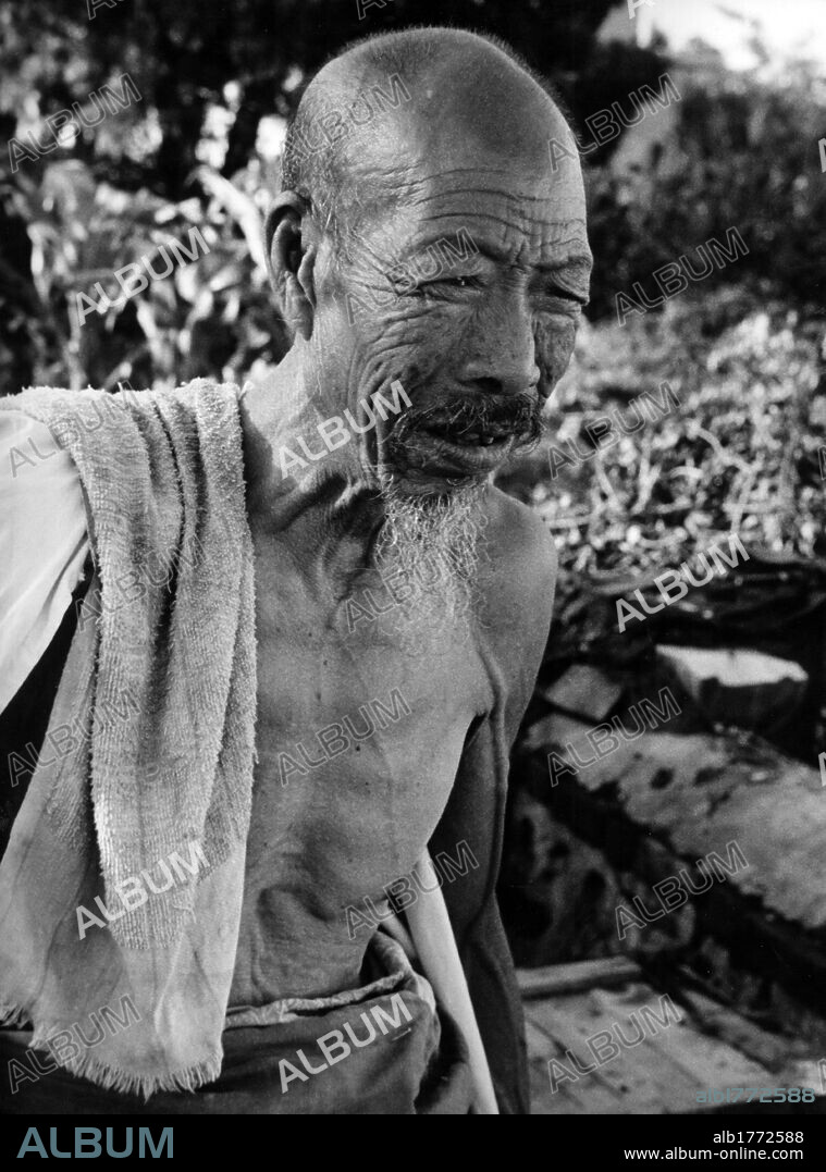 Portrait of a Chinese farmer. Portrait of an old farmer of Northern China. China, 1961.