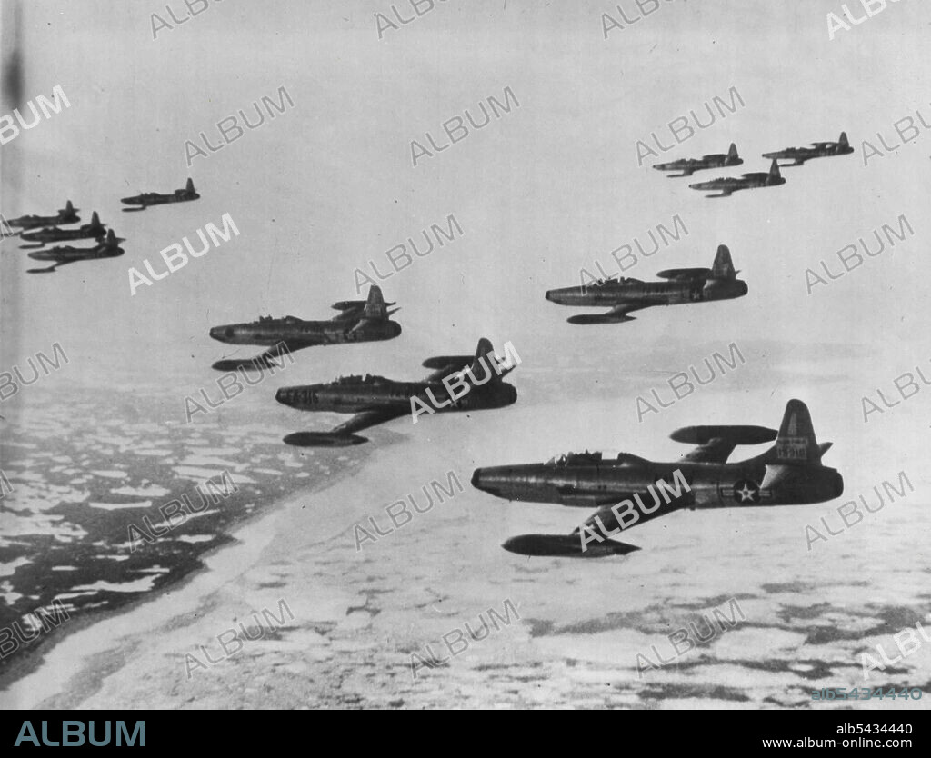 A formation of F-94s, new jet fighter interceptors, fly over ice-choked Cook inlet near Anchorage, Alaska, on a training flight. These Lockheed" all weather planes" capable of hunting down an enemy plane in darkness or storm with airborne radar, are now operating from Alaskan and Japanese bases. January 01, 1952.