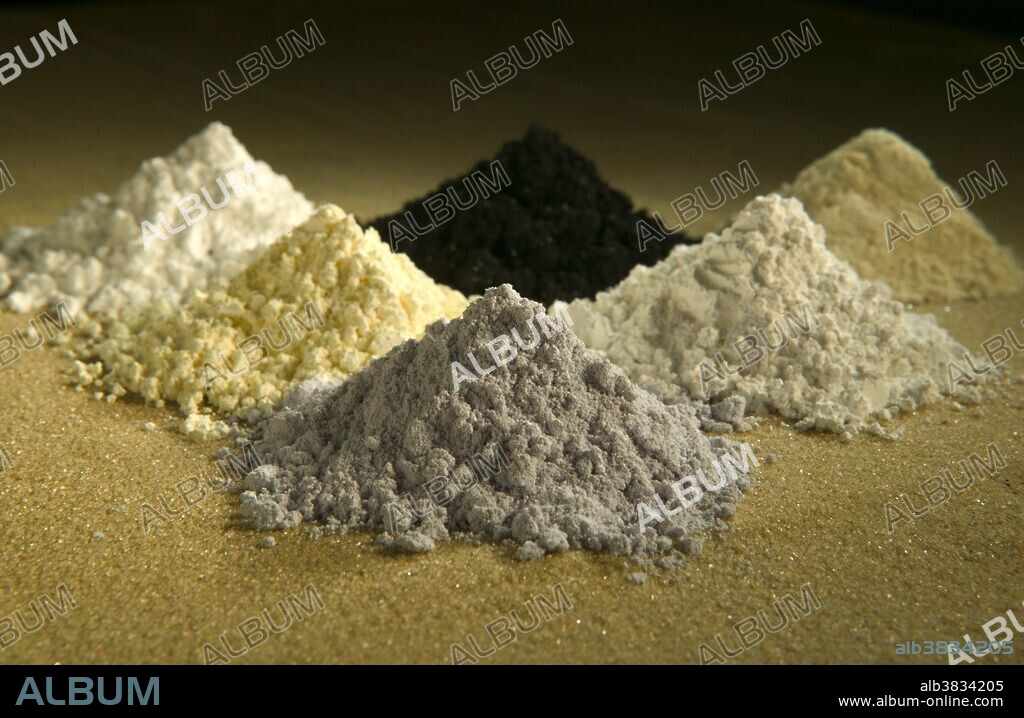 Rare-earth oxides that are used as tracers to determine which parts of a watershed are eroding. Clockwise from top center: praseodymium, cerium, lanthanum, neodymium, samarium, and gadolinium.