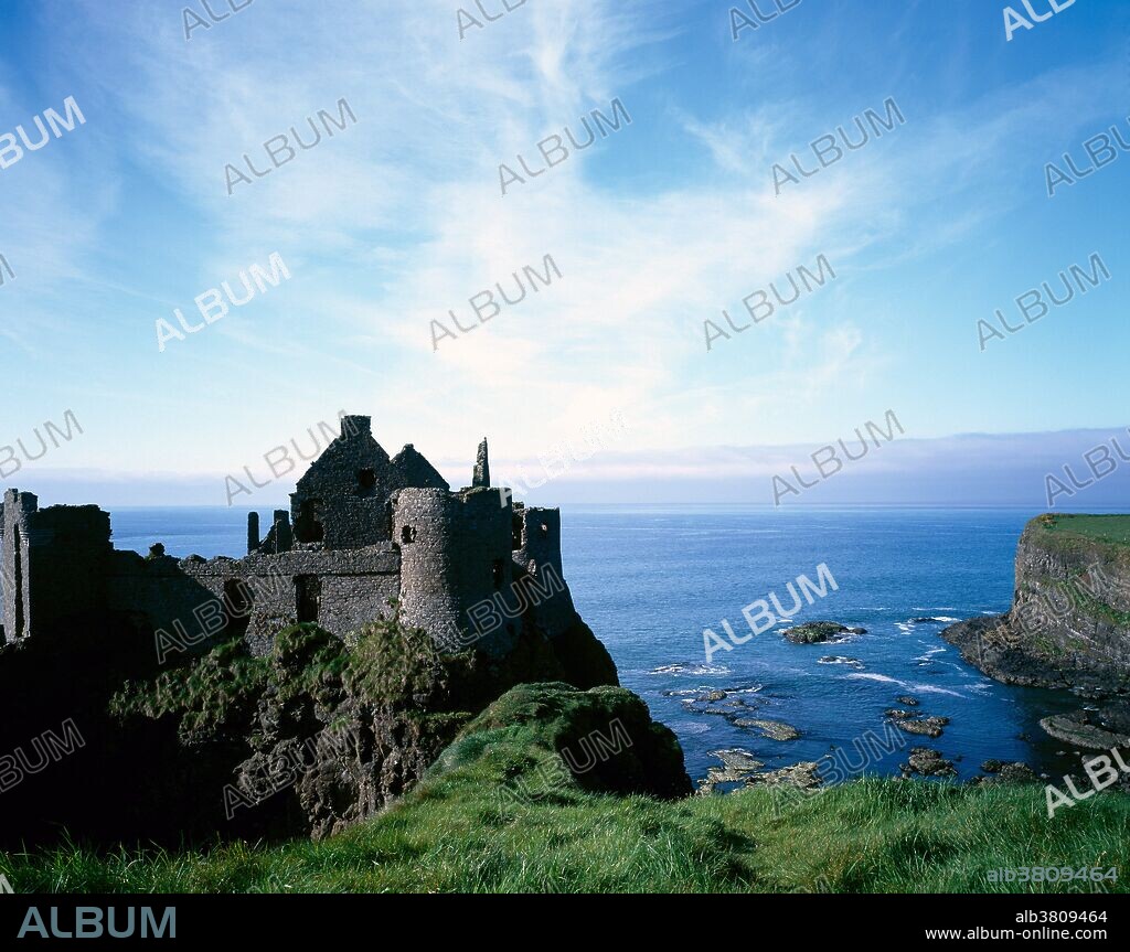 The one time main fortress of the MacDonnells,Chiefs of Antrim dates from the 13th Century. The roof is gone,but the ruins are remarikbly intact,and the setting is spectacular.