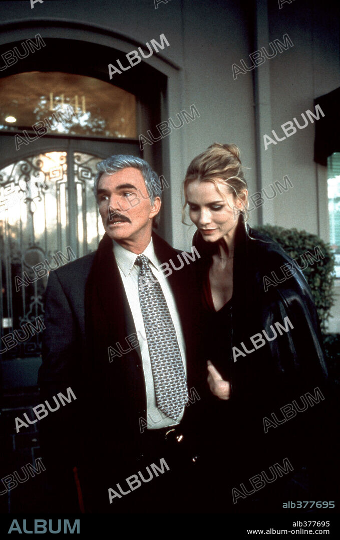 BURT REYNOLDS and SAFFRON BURROWS in TEMPTED, 2001, directed by BILL BENNETT. Copyright GOFD CIRCLEE FILMS/CHEATER LLC/B.J. FILMS/TF 1 INTERNATIONAL.