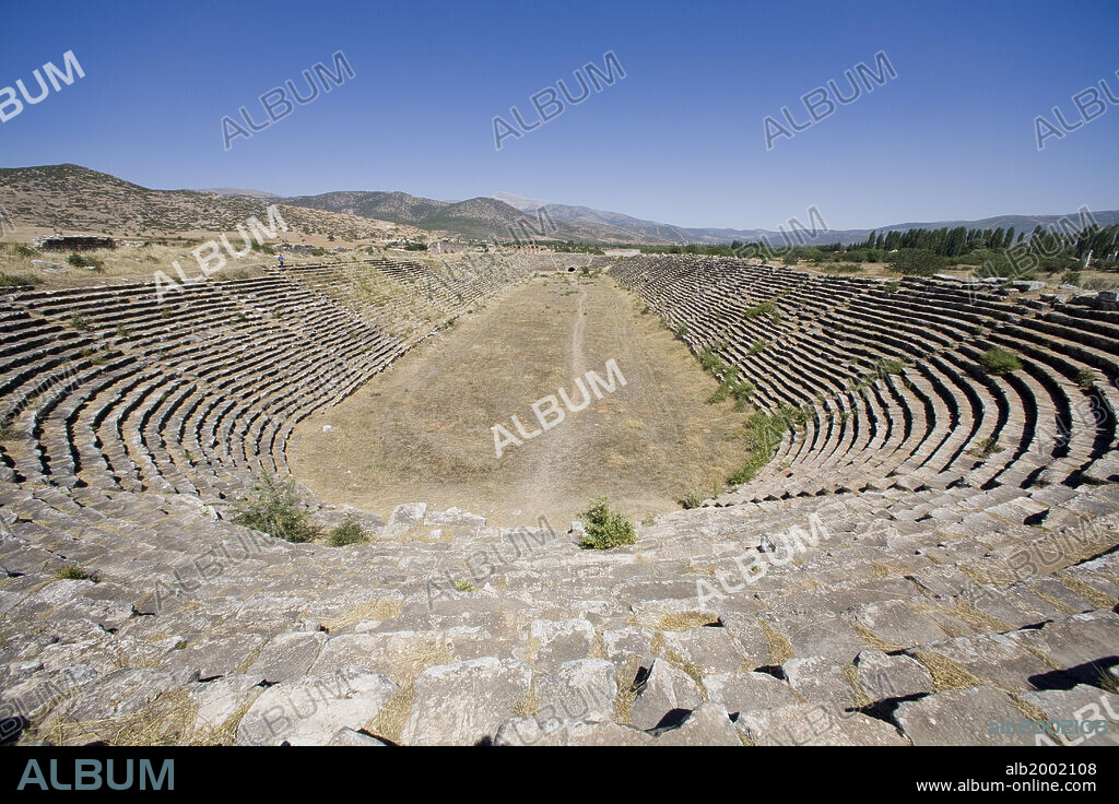 The stadium is the best preserved structure in Aphrodisias. In fact, it is one of the largest and best preserved stadiums in the Mediterranean Basin. It is 262 m long and 59 m wide, and could accommodate as many as 30,000 people. It was probably built in the 1st or 2nd century AD and was used for athletic and public events. During the Byzantine period, after the theater was damaged in the 7th century earthquake, the east end of the stadium was modified into a smaller arena, that was probably used for gladiatorial and beast shows.