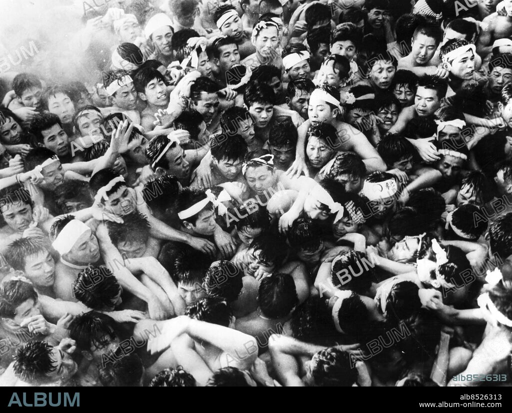 AICHI, JAPAN - 19620310. The 1 200 year old nude festival of the Konomiya  Shrine in Japan. Somewhere in the middle of the 16 000 men participating,  is the 