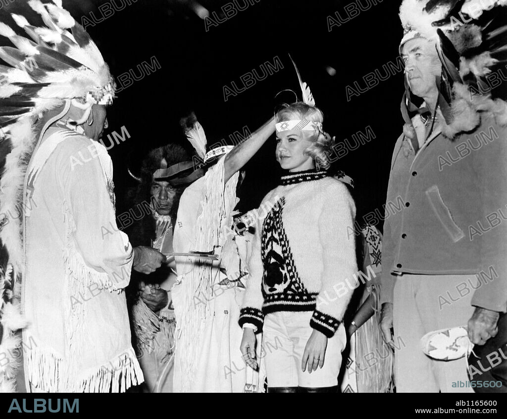 CARROLL BAKER and JAMES STEWART in CHEYENNE AUTUMN, 1964, directed by JOHN FORD. Copyright WARNER BROTHERS.