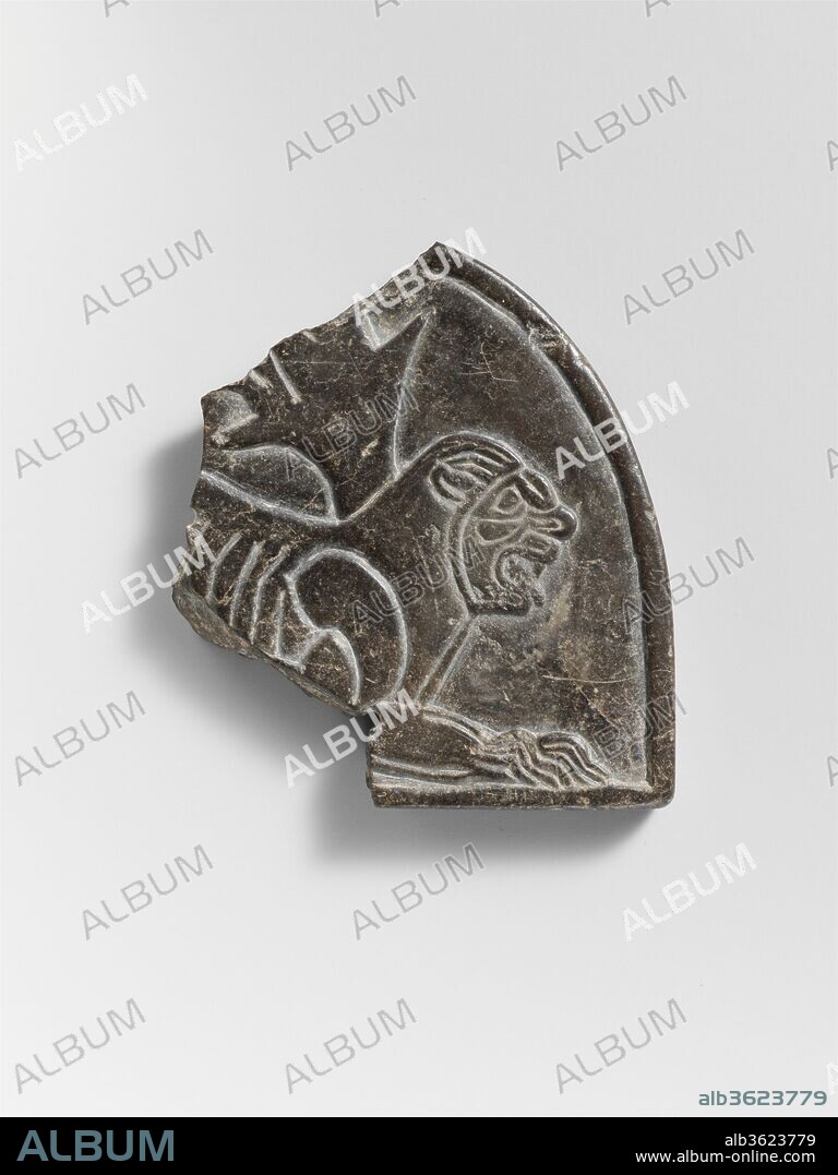 Plaque with the figure of a lion. Culture: Achaemenid. Dimensions: H. 2 1/2 x W. 2 3/4 in. (6.4 x 7 cm). Date: ca. 6th-5th century B.C..