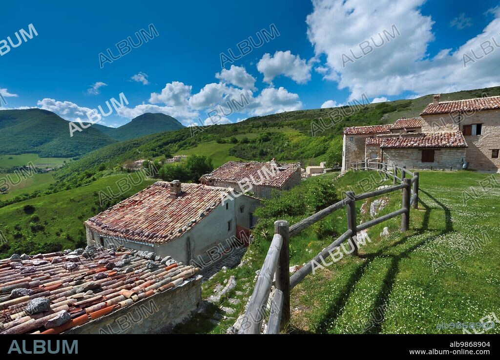Borgo di Elcito, in the municipality of San Severino Marche (Italy; Marche, province of Macerata). View of the village, in the background Mount San Vicino.