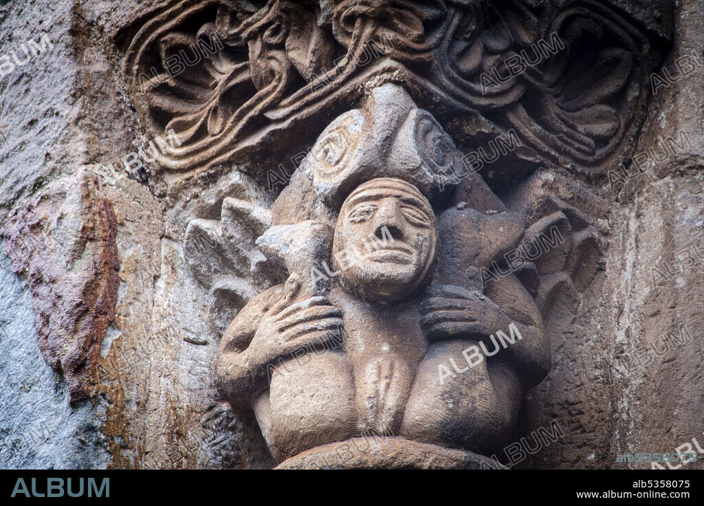 woman showing her sex collegiate church of San Pedro de Cervatos  